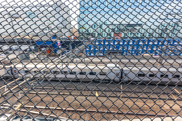 istock Wire mesh with a train station on background in Stockholm 502819564