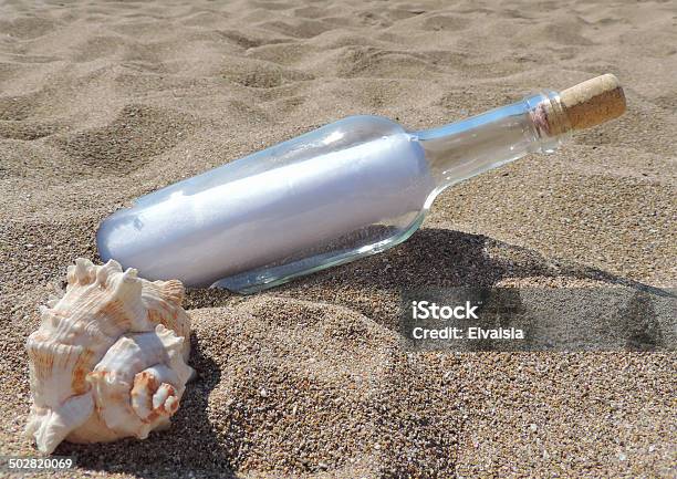 Message In A Bottle Stock Photo - Download Image Now - Animal Shell, Assistance, Beach