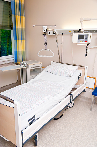 Interior of a hospital room with a hospital bed.3D rendering illustration.