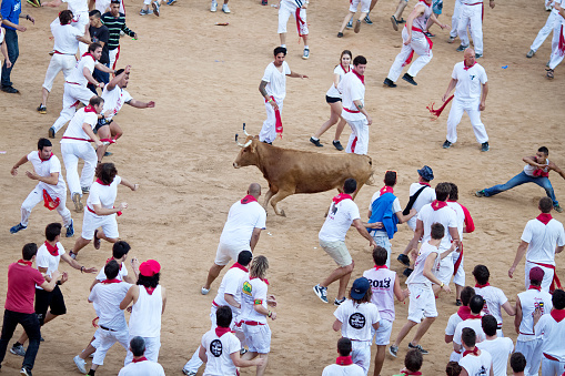 Pamplona, Spain - July 8, 2013: People await start of race of bulls at San Fermin festival. Navarra