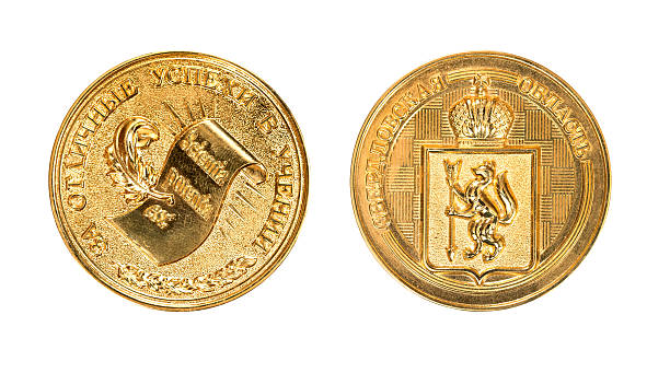 Gold school medal of Russia Gold school medal of Russia. The medal inscription "For excellent achievements in the teaching of". Scientia potentia sable stock pictures, royalty-free photos & images
