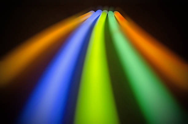 istock Bright colorful lengths of light with bokeh effect- on black 502840670