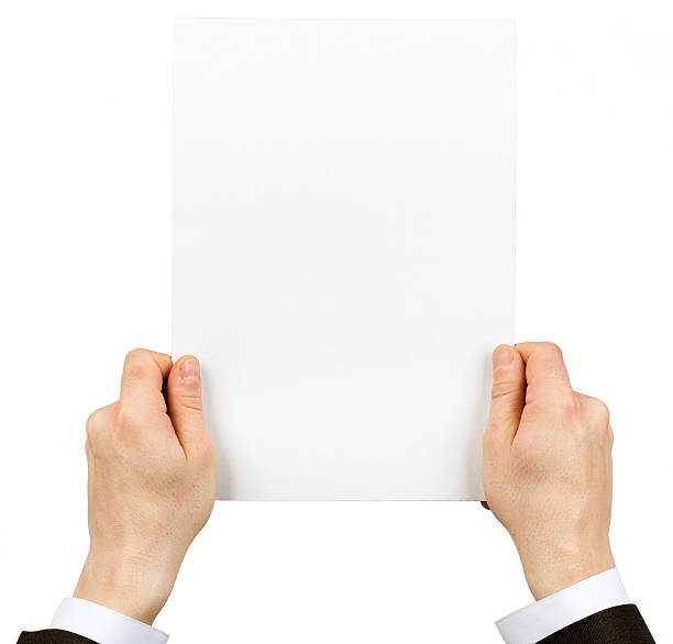 istock Businessman holding empty paper 502840996