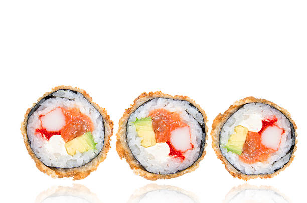 istock Deep-fried Japanese roll with crab meat, salmon, avocado, caviar 502843030