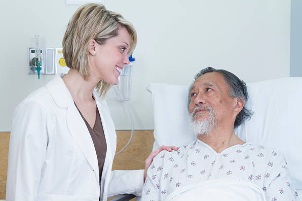 istock Nurse Comforting Patient 502845278