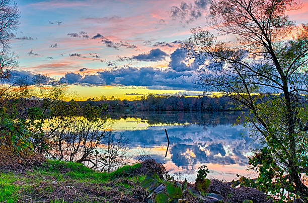 istock sunset and reflection with beautiful sky rainbow colors 502846020