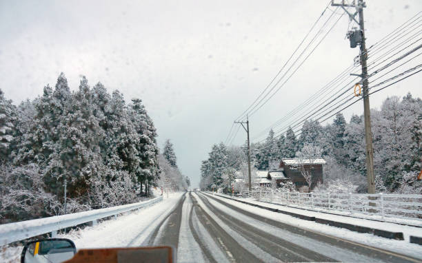 istock Driving on lonely snow country road 502846384