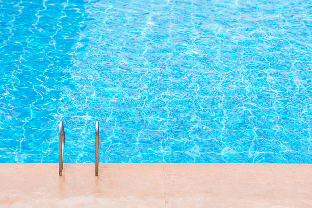 istock blue swimming pool at hotel with stair 502851934