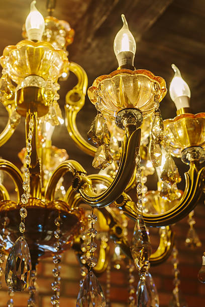 istock classic retro chandelier crystal lamp with wooden ceiling interior background 502852164