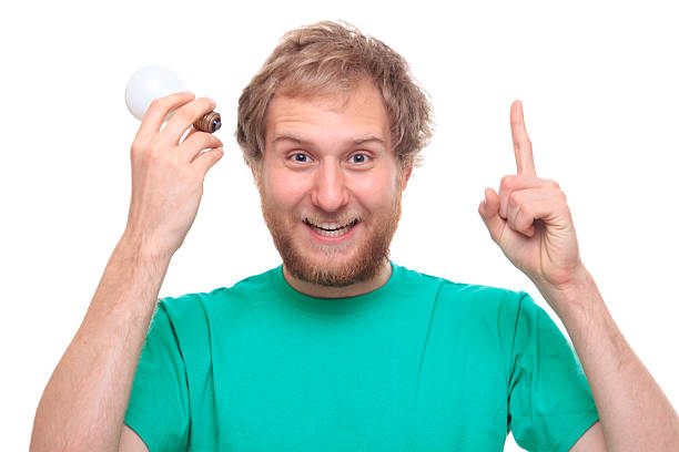 Man with idea and a bulb stock photo