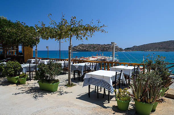 istock Greek tavern with view on Spinalonga island 502859059