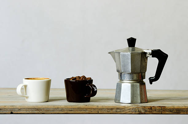 istock two cups of coffee and beans, percolator 502859237