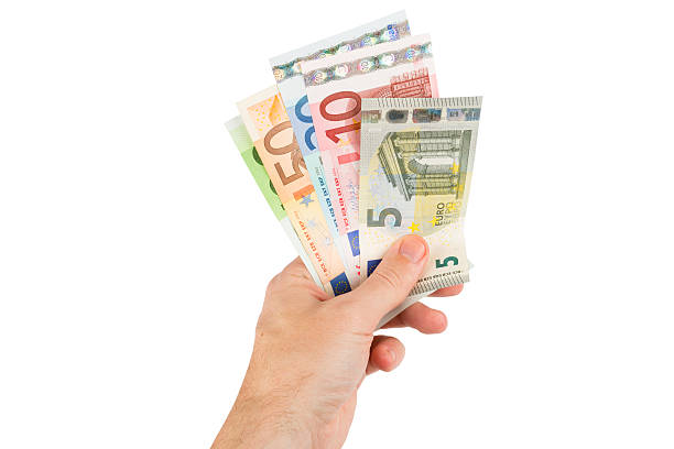 istock Euro banknotes in hand closeup 502860653