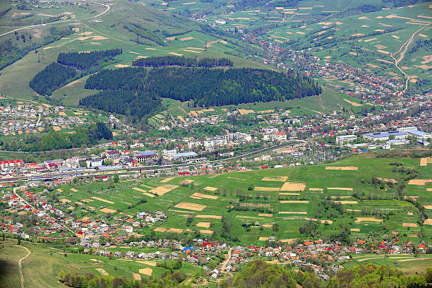 istock Aerial view on town in mountain Valley 502861153