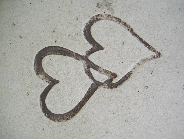 istock Two Heart Shapes, Carved in Stone 502861891