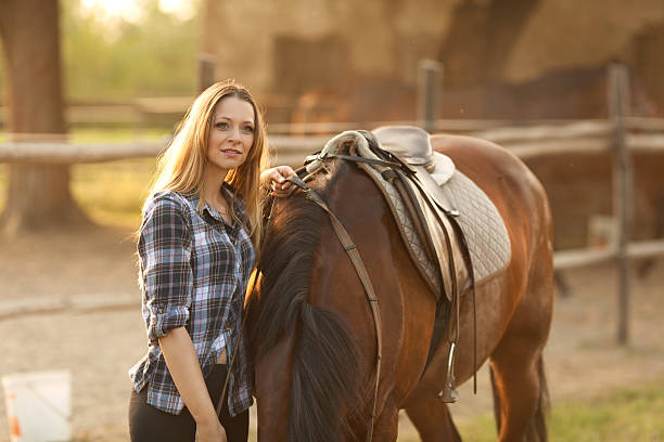 istock Woman and a horse 502862757