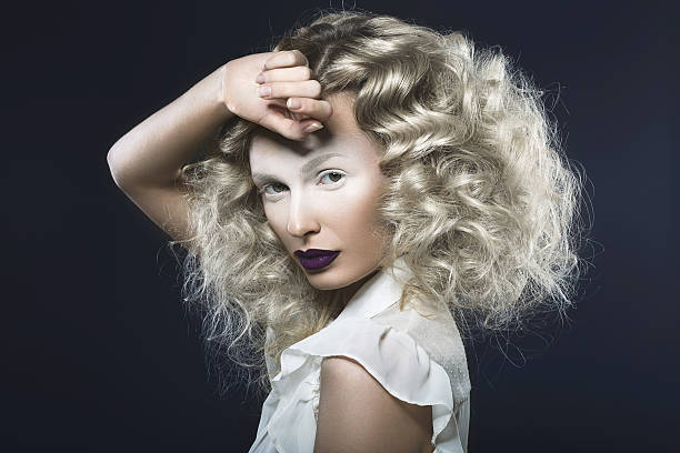 istock beautiful girl with violet lips and pale eyes. 502862821