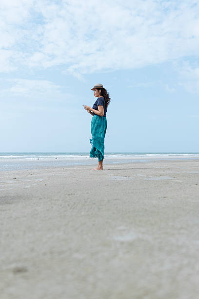 istock Smartphone User Lifestyle On The Beach 502863133