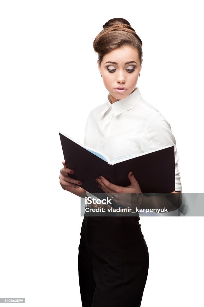 young smiling business woman young smiling business woman holding blue diary isolated on white Adult Stock Photo