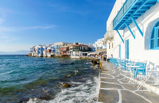 Chora, Myconos, Greece - 5 May, 2013: Little venice, aka Alefkandra, mikri Venetia a landmark of Chora in greek island Mykonos, Greece. Picturesque coffee shops and restaurants overlooking the aegean with colourful balconies hanging over the blue sea.