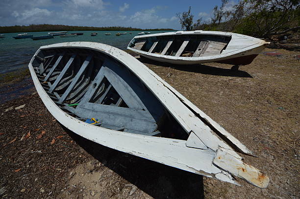 Fishermen boats on sea shore stock photo