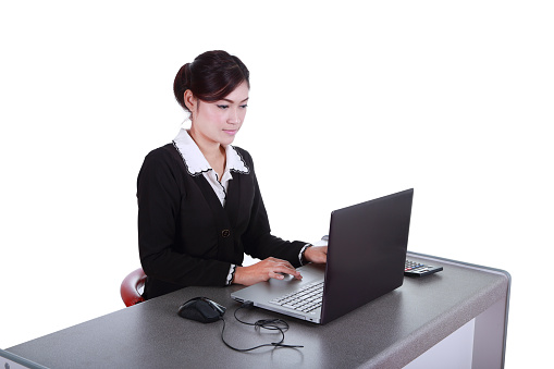 Business woman with a laptop - isolated on white background