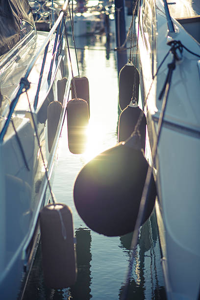 istock Fenders on sail boats moored at harbour 502867224