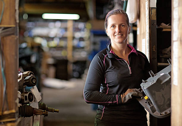 istock Female mechanic at a storage centre 502868758