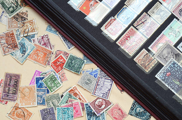 istock Album with old postage stamps 502869426