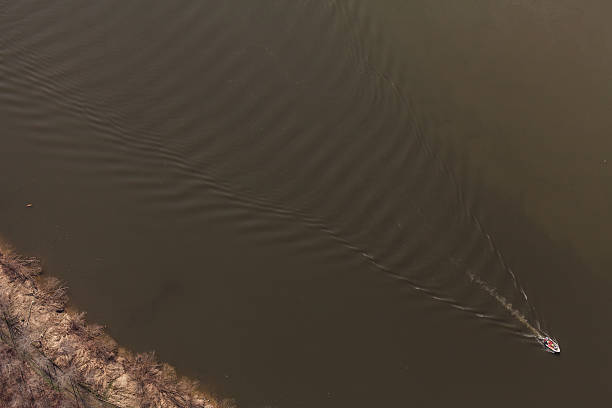 istock aerial view of a river worker motorboat 502869870