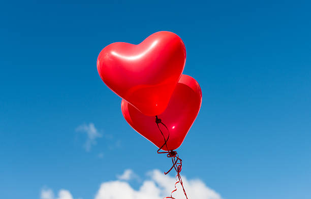 istock red heart balloons outdoors 502870654