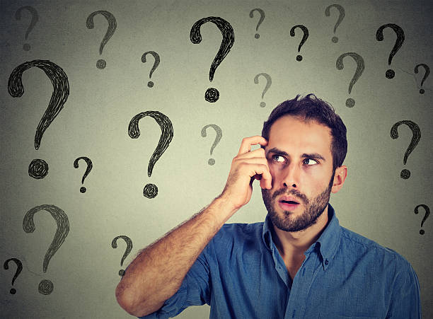 istock Thoughtful confused handsome man has many questions no answer 502872672