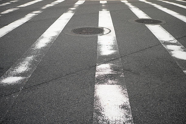 istock pedestrian crossing and manhole JAPAN 502885426