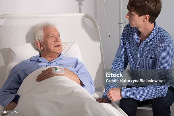 Boy Visiting His Grandpa Stock Photo - Download Image Now - 2015, Adult, Assistance