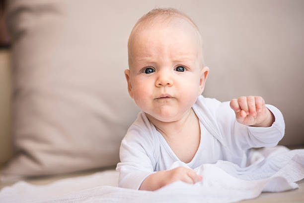 istock Beautiful little baby boy lying down 502887586
