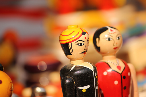 beautiful couple clay dolls in colorful attires
