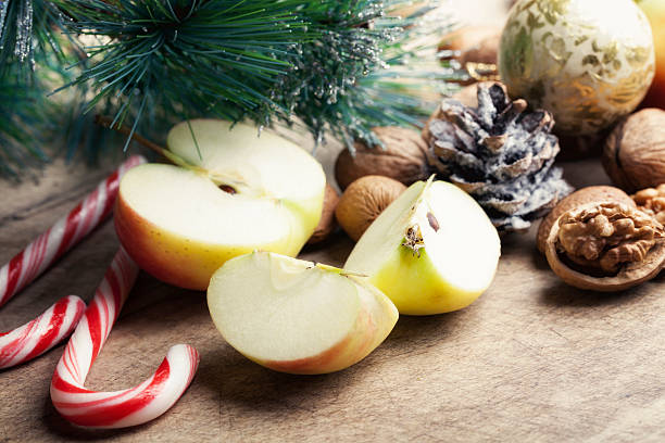 istock tradional christmas food nuts and apple walnut sugar cane 502888649