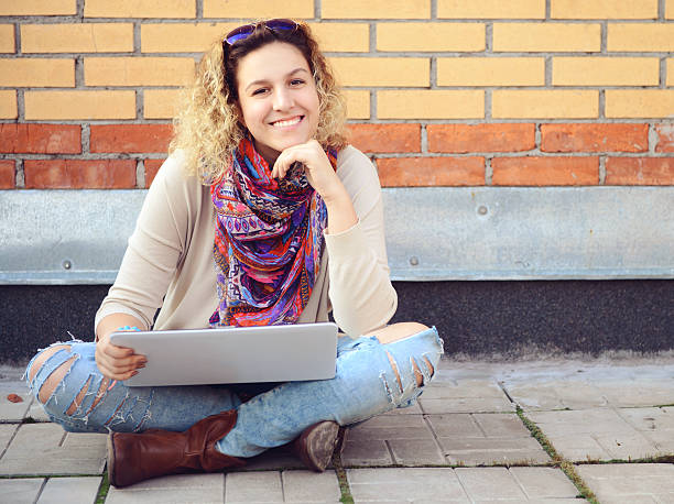 istock young girl using a laptop 502890450