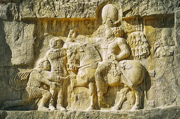 Naqsh-e Rustam is one of the archaeological sites in Iran and contains monuments of the Achaemenid and Sasanian dynasties. The oldest relief at Naqsh-i Rustam dates back to 1000 B.C.