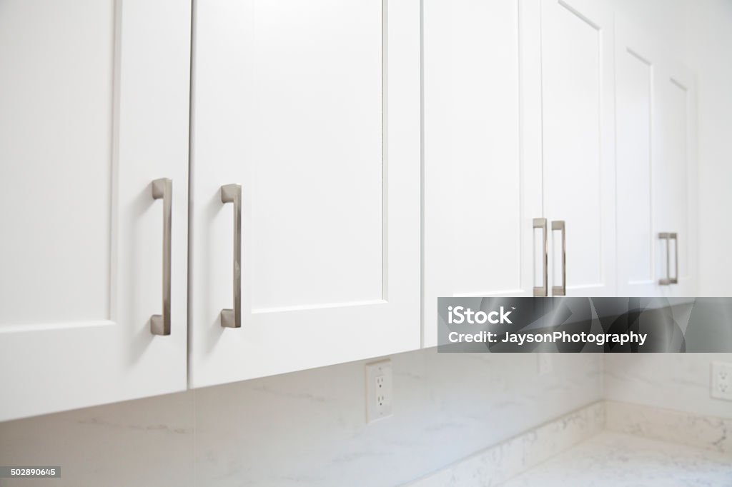 White kitchen cabinet White kitchen cabinet in kitchen Cabinet Stock Photo