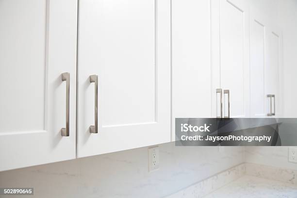 White Kitchen Cabinet Stock Photo - Download Image Now - Cabinet, Kitchen, Apartment