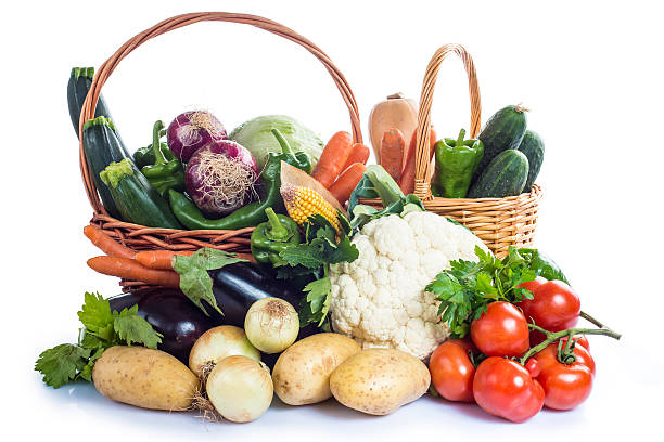 Vegetables isolated on a white background A basket with assortment of vegetables isolated on a white background pickled turnip stock pictures, royalty-free photos & images