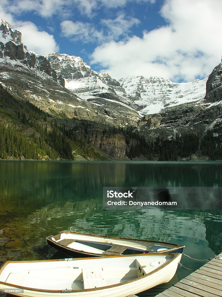 Wooden boats at Lake O'Hara, Yoho National Park, Canada Wooden boats at Lake O'Hara, Yoho National Park, British Columbia, Canada Autumn Stock Photo