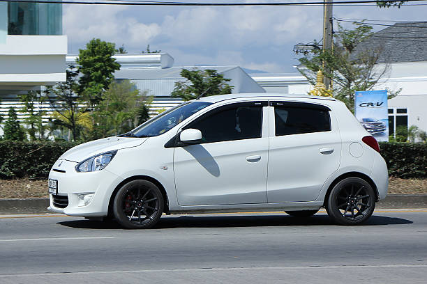 Chiangmai, Thailand -November 2, 2015: Private Mitsubishi Mirage Eco car. Photo at road no.121 about 8 km from downtown Chiangmai, thailand.