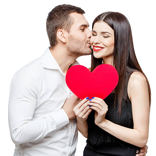 istock Young beautiful couple with present isolated on white 502896514