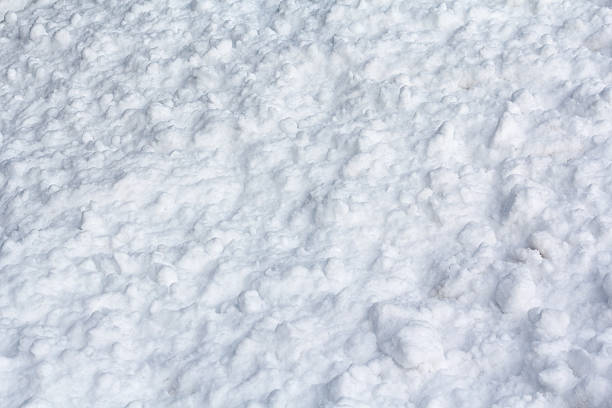 istock Lumps of snow illuminated by light. Backgrounds and textures 502898900