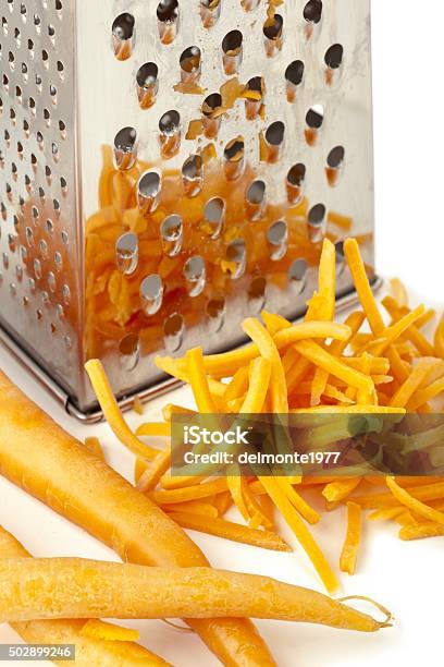 Rub Fresh Carrots In The Scraper Stock Photo - Download Image Now - 2015, Baby Carrot, Carbohydrate - Food Type