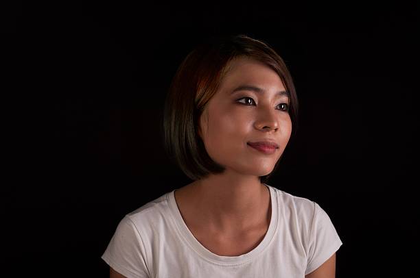 Young Vietnamese Girl on Black stock photo