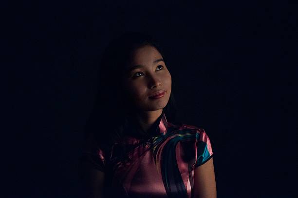 Young Vietnamese Girl on Black stock photo