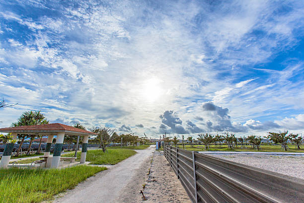 istock Fence, road and rising sun, HDR 502909347